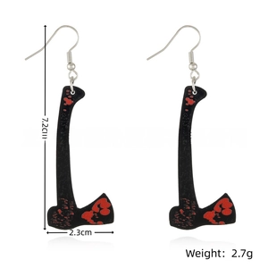Detail view of Halloween acrylic ax earrings with red blood splatter and metal hooks