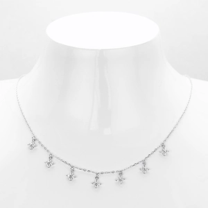 S925 sterling silver clavicle necklace with seven zircon floral pendants on white model