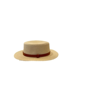 Classic boater hat in beige straw featuring a brown leather belt detail on plain background