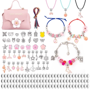 Pink DIY jewelry making kit for kids with handbag charms and colorful cords