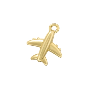Macro shot of a golden airplane pendant with metallic finish and top loop detail