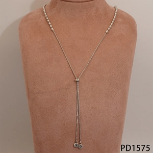 Detail of Y-shaped stainless steel necklace with marquise beads and crystal drop pendants