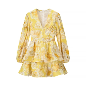Elegant yellow V-neck floral dress with long lantern sleeves and layered ruffle hemline