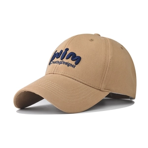 Close-up of khaki cotton baseball cap featuring blue Wim CreatingDesigner embroidery