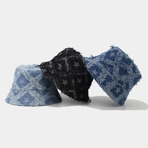 Denim bucket hats with star patterns and frayed edges in blue and black colors
