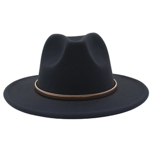 Detailed close-up of wide brim black wool felt hat with decorative golden metal ring trim