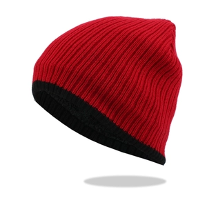 Red ribbed knit beanie with black trim border shown from a 45-degree angle