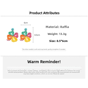 Detail size specifications of handmade multi-colored raffia flower woven earrings with silver pins