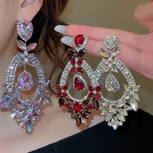 Elegant teardrop rhinestone earrings in iridescent, ruby red and aurora white colors