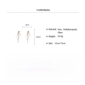 Detail view of long tassel flower earrings with dimensions and iron material attributes