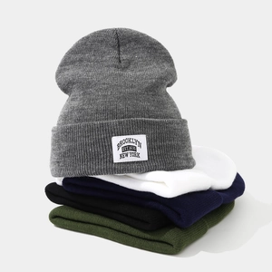 Knitted beanie hats set in multi-color featuring Brooklyn patch and ribbed texture