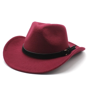 Detail of burgundy wool western cowboy hat featuring black leather belt and gold buckle