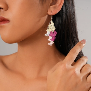 Colorful hollow butterfly drop earrings with multiple layers for a vibrant summer vacation look