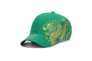 Detail view of emerald green baseball cap with gold Chinese dragon and calligraphy