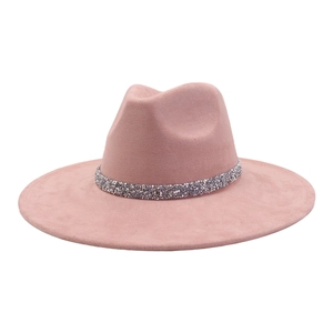 Detail of soft pink faux suede fedora hat with elegant silver rhinestone hat band decoration