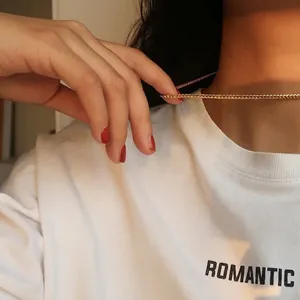 Minimalist gold-plated Cuban link chain necklace for women with sleek metallic weave texture