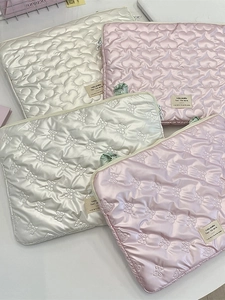 Quilted heart and bow laptop sleeve cases in satin pearl white and light pink colors