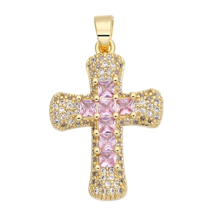 Detailed view of golden cross pendant with pink square zircon and white micro-pave stones