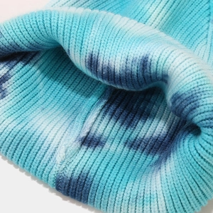 Blue and white tie-dye knitted beanie with folded cuff for women in autumn and winter