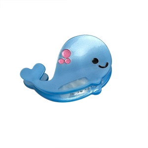 Cute blue whale claw clip for hair featuring cartoon ocean animal design with a pearly finish