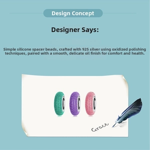 Detail of 925 sterling silver silicone spacer beads in green, purple, and pink colors