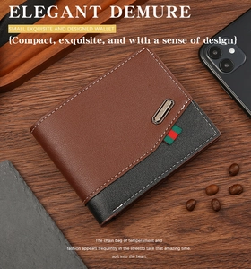 Detail of men's bifold wallet in brown and black leather with red-green stripe accent