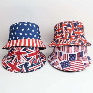 Close-up of fashion bucket hats featuring United States and United Kingdom flag patterns