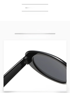 Detailed close-up of the strong metal hinge design on black oval frame sunglasses