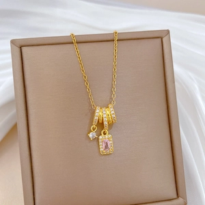 Elegant gold titanium necklace with pink square zircon and crystal tassel pendant