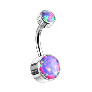 Macro shot of silver G23 titanium belly ring with iridescent opal bezel set stones