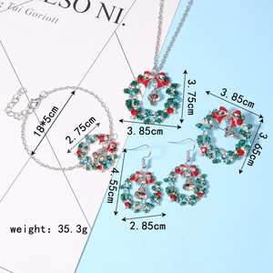 Macro detail of Christmas wreath jewelry set with crystal bells and dimensions