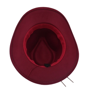 Detail of burgundy wool western hat interior showing inner sweatband and product label