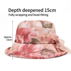 Women's pink floral organza sun hat with a 15cm deep crown and chiffon bow accent