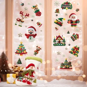 Christmas static window decals with crochet style Santa and reindeer on glass pane