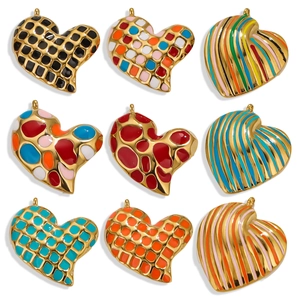 Vintage heart shaped leopard print enamel earrings set in polished stainless steel