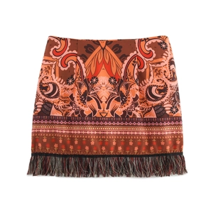 Ethnic bohemian paisley print mini skirt with knotted design and fringe trim detailing