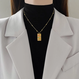 Minimalist square textured gold necklace for women with multi-colored gemstone pendant