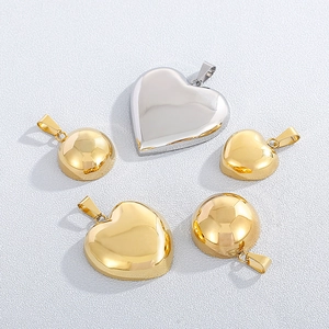 Polished stainless steel heart-shaped pendants in silver and gold finishes for jewelry making