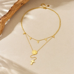 Double-layered gold stainless steel necklace with Saint Benedict medal and cross pendants