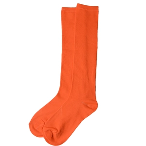 Detail of orange knee-high socks with three white stripes and soft cotton blend fabric