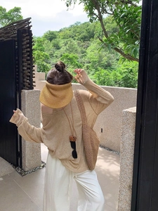 Outdoor look featuring a beige sheer long sleeve sun protection top and white wide pants
