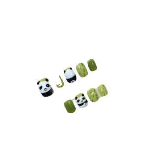 Handmade cute panda press-on nails with bamboo green hand-painted art and leaf design
