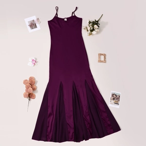 Detailed view of the dark purple satin dress with pleated slit and elegant draped hem