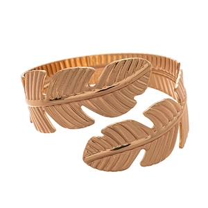 Elegant gold leaf geometric open cuff bracelet with detailed metallic branch texture