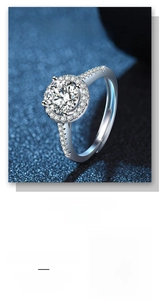 Detailed close-up showing adjustable silver heart ring with sparkling pavé cubic zirconia