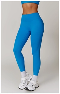 Close-up of high-waist yoga leggings in royal blue fabric with supportive fit