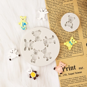 DIY silicone mold set for bear-shaped chocolate and resin art with colorful finished crafts