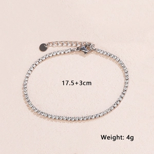 Detail of adjustable silver zircon tennis chain with lobster clasp and extension link