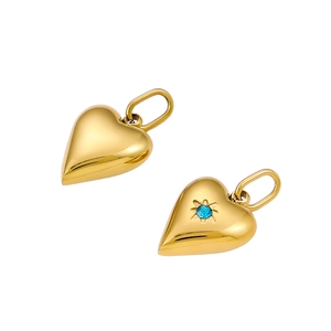 Polished gold heart pendants with blue zircon starburst engraving in stainless steel