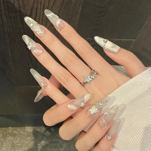 Cat eye butterfly press-on nails with champagne glitter, pearls and rhinestones